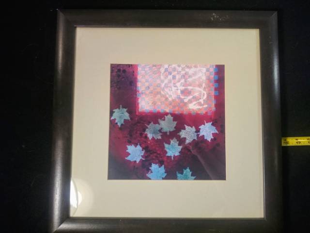 Wood and glass framed painting